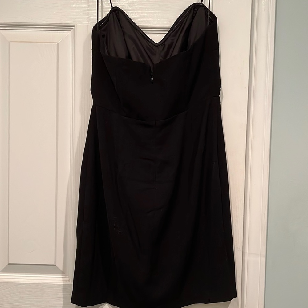 Strapless black dress with bow in front